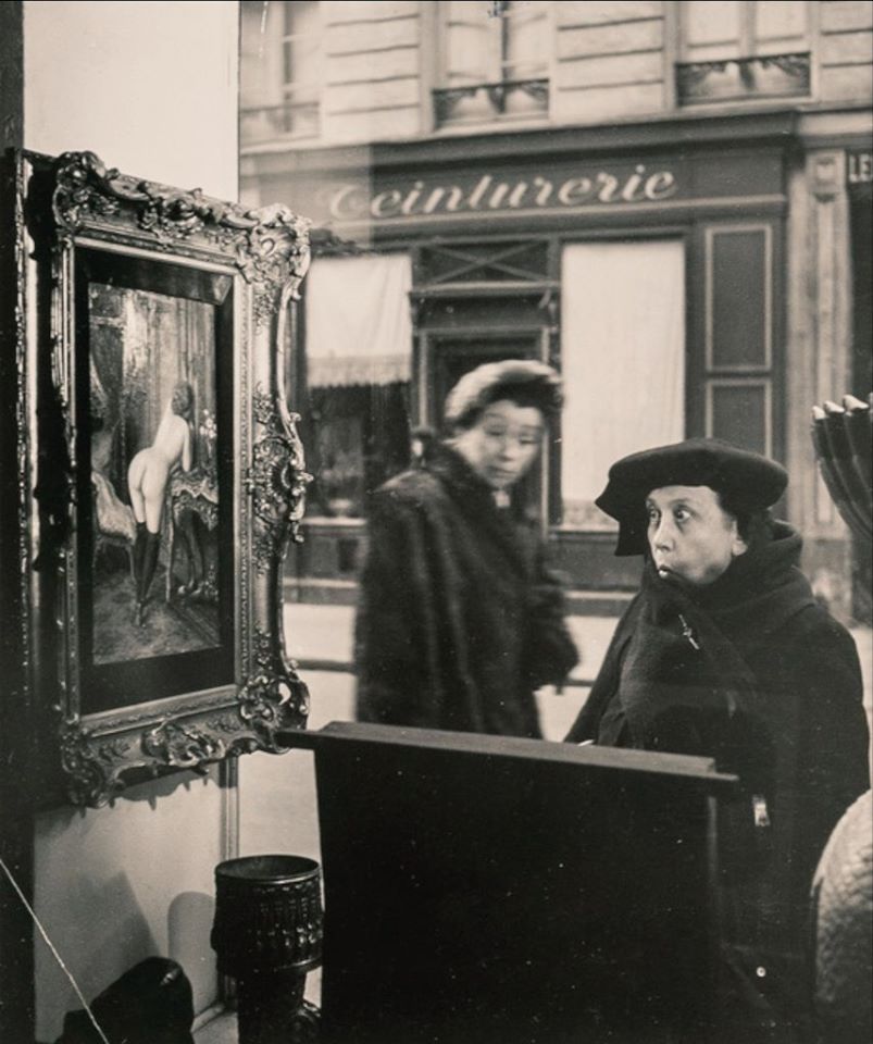 Robert Doisneau - Indignant Lady (La Dame Indignée), 1948 A woman is registering shock at a painting of a female nude in front of a Paris shop window. #RobertDoisneau