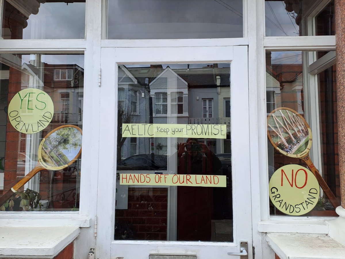 SaveWimbldnPark's tweet photo. A porch in Southfields with a clear message #windowwanderland @Wimbledon @CPRELondon @WimSoc @friends_earth @FoWimbledonPark @MayorofLondon @PutneyFleur @S_Hammond @MailOnline @BeraSW19 @TiCLme @WarrenFarmNR @guardianeco #environment #greennotgreed https://t.co/wWK9OekARP