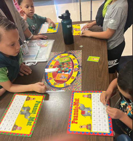 Learning Tree students @NISDHenderson play Feed the Spider/ Shapes Math and Peanut Mat/ Addition and Subtraction during after school time. @ReallyGoodStuff