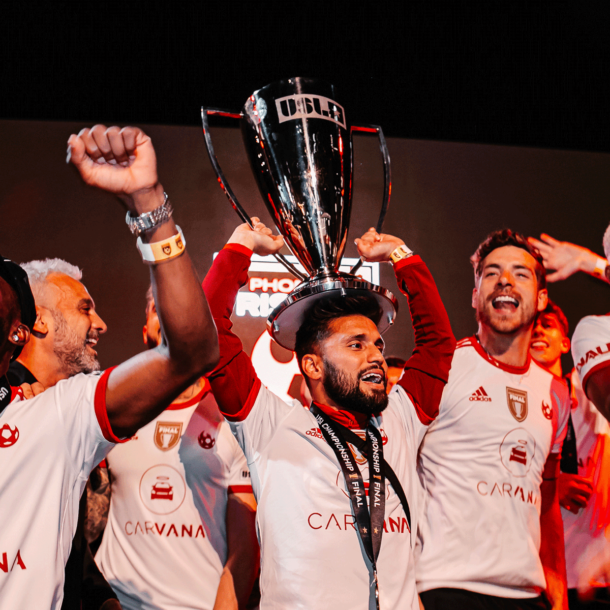 PHXRisingFC's tweet photo. Easy to look "lil" standing next to this big trophy. https://t.co/zHYMR2U6Cf
