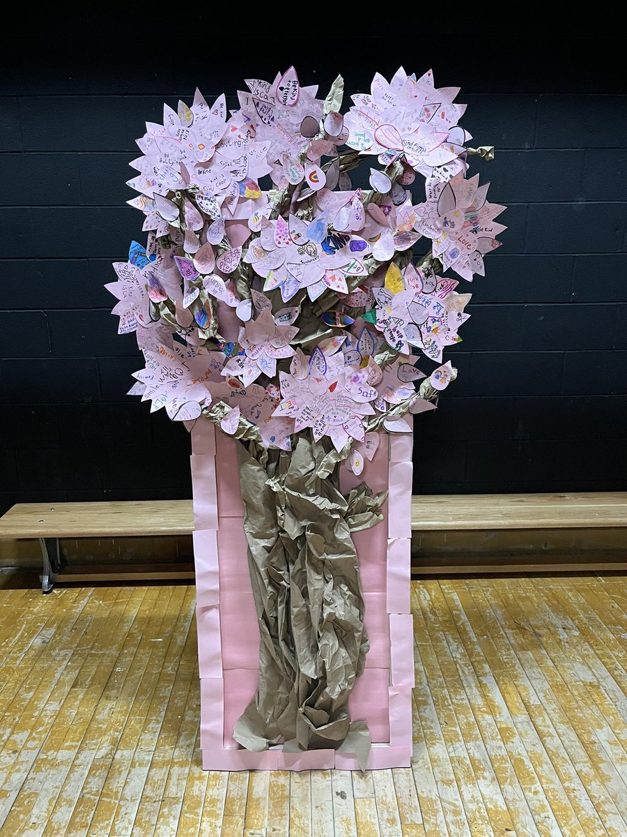 Our Kindness Tree, made from pink leaves decorated by every student from K-8. Made just in time for our Pink Shirt Day/Kindness assembly tomorrow. @APSMustangs @AndreaMaziak