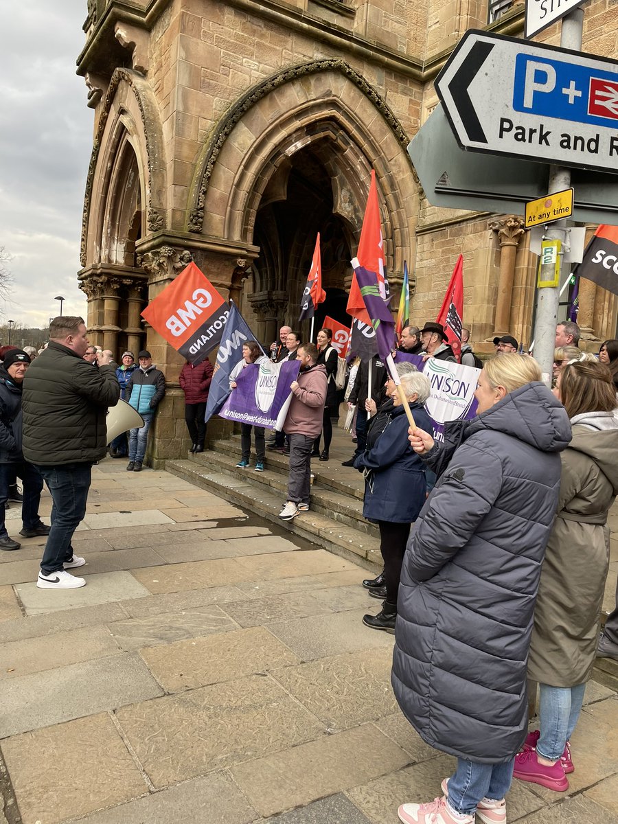 clydebankpost's tweet image. @AidanCMacdonald is outside West Dunbartonshire Council headquarters as several unions and members of the public have gathered to protest against £8.3 million in proposed cuts to public services.
