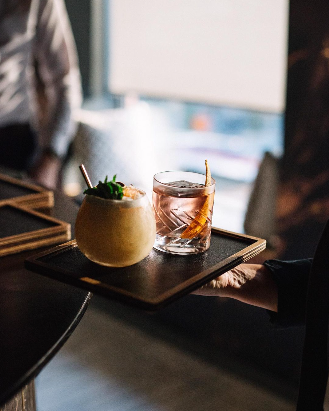 It's all in the details for this Michelin star restaurant, right down to the coasters and trays. We custom produce this serveware  for downtown Toronto's Alo Restaurant using buttery black leather, mirrored gold acrylic, and rich cherry wood. *Chef's kiss*