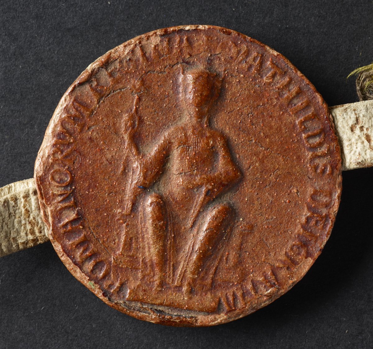 Our medieval woman to celebrate today, in the run up to #InternationalWomensDay2024, is Empress Matilda (d. 1167), the daughter of King Henry I.

Here is her charter re-founding Bordesley Abbey in 1141-42, affixed with Matilda's seal enclosed in its own silk seal bag.