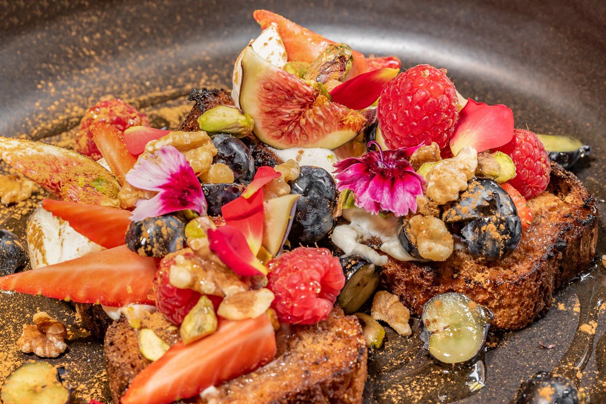 Indulge in our bestselling Banana-Rama French Toast at Wolfy's Bar today! 🤤 Made with homemade banana bread, mascarpone cheese, fresh fruit, nuts, honey, and cinnamon. #brunchgoals #frenchtoastlove #foodieheaven 🍴😋 linktr.ee/wolfysbar