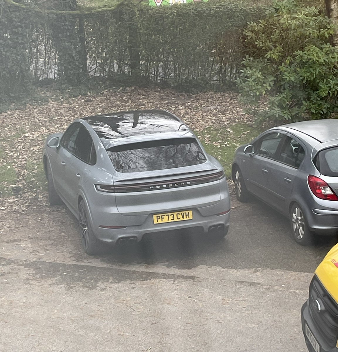 Sorry for the bad quality photo, was taken from an office window! Brand new in October #2023 is this @porsche @porschegb #cayenne #ehybrid #coupe - probably a #v6 - still looks like a brand new car for another couple of days until the #24plate is launched. #germanwhip #supersuv