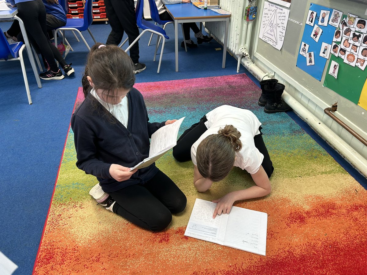 P3/4 working in writing buddies to peer check their work has:
* Capital Letters and Full Stops in right places. 
* Finger Spaces between words.
* Neat Presentation.
* Sentences make sense.
* P4’s have used , ?!••• “ “ where appropriate.