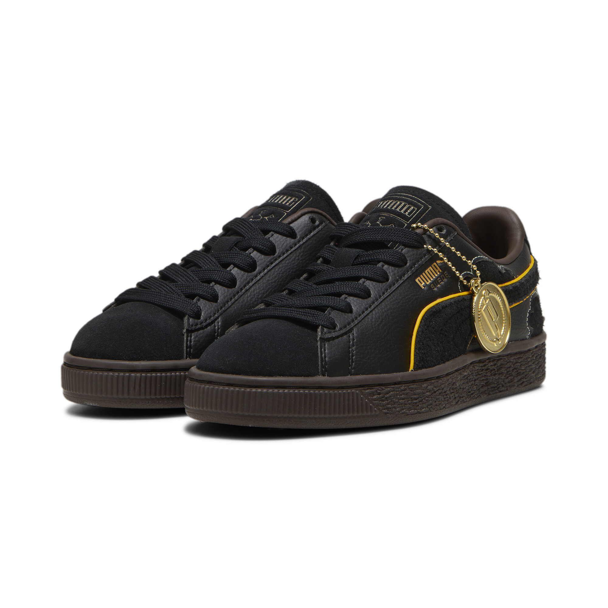 Black and top gold pumas 5k