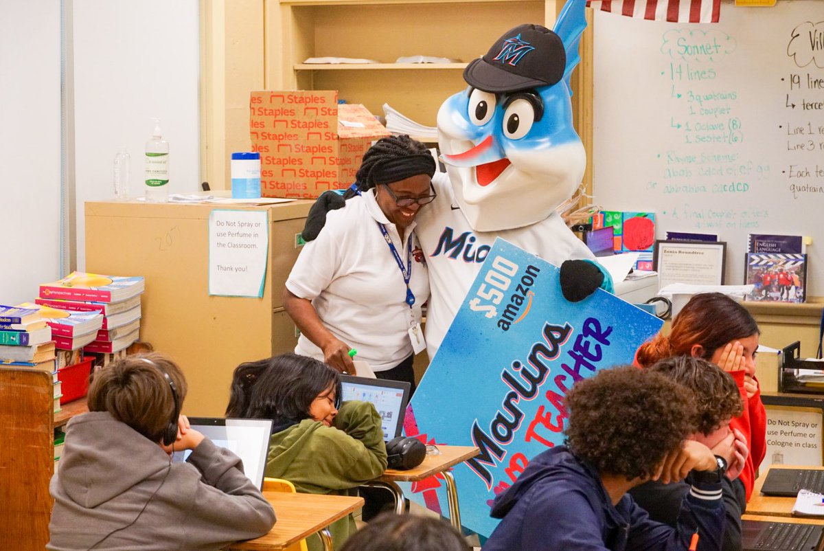 MarlinsImpact's tweet photo. Billy the Marlin surprising another MVP Teacher in South Florida with the support from @amazon! 💙

Ms. Roundtree is a beacon of inspiration at Kinloch Middle School. With 40+ years of teaching, Ms. Roundtree has taught many lessons, touched many lives, and inspired many minds. https://t.co/D19HGc4oZl