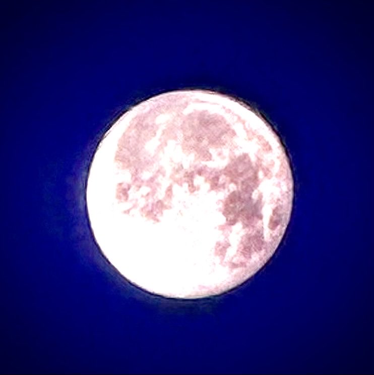 The captivating view of a beautiful full moon, as seen from 40k feet above the ground! 🌕✨✈️ #amazinguniverse