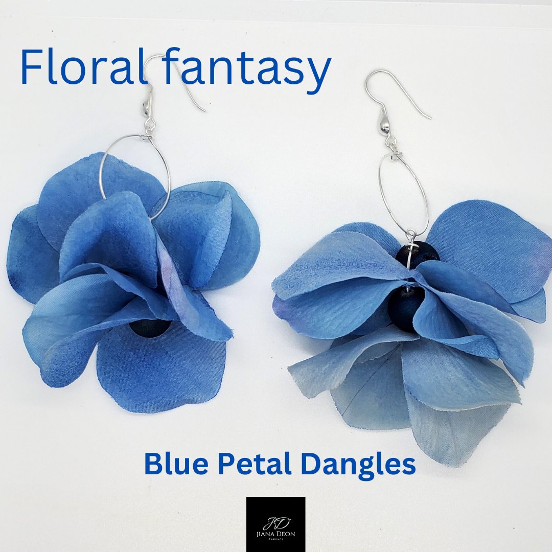 Whether you're dancing under the moonlight or adding a pop of color to your everyday look, Blue Petal Dangles will turn heads and steal hearts.

#BloomingWithBeauty #BlueEarrings #StatementPiece #SummerVibes
