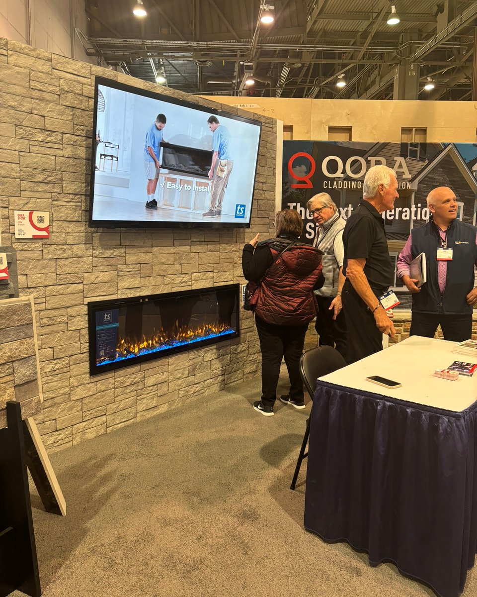 The Arcitell | Qora Cladding Booth at #IBS2024 is hopping! If you're in Las Vegas for the International Builders Show, come see the custom built fireplace accent wall in Booth C9335 featuring Qora Stone™ Ashlar Drystack panels and a Touchstone Sideline Elite® 60 Smart Electric