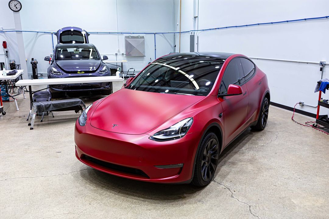 stek_usa's tweet photo. Have you ever wondered what DYNOmatte looks like over Tesla’s Ultra Red paint? If so, you’re in luck! The team at Metropolitan Detail wrapped this Model Y in our matte paint protection film, and we love the final result. #STEKrevolution #DYNOmatte #matteppf #ppf https://t.co/SIXs0uDcnv
