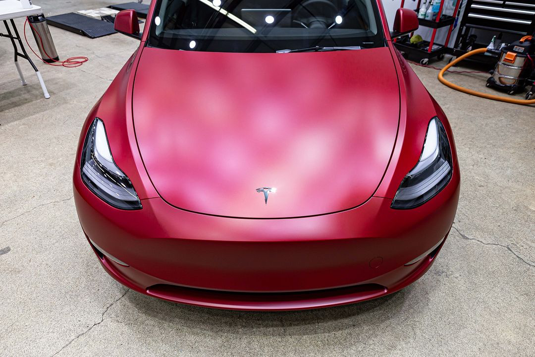 stek_usa's tweet photo. Have you ever wondered what DYNOmatte looks like over Tesla’s Ultra Red paint? If so, you’re in luck! The team at Metropolitan Detail wrapped this Model Y in our matte paint protection film, and we love the final result. #STEKrevolution #DYNOmatte #matteppf #ppf https://t.co/SIXs0uDcnv
