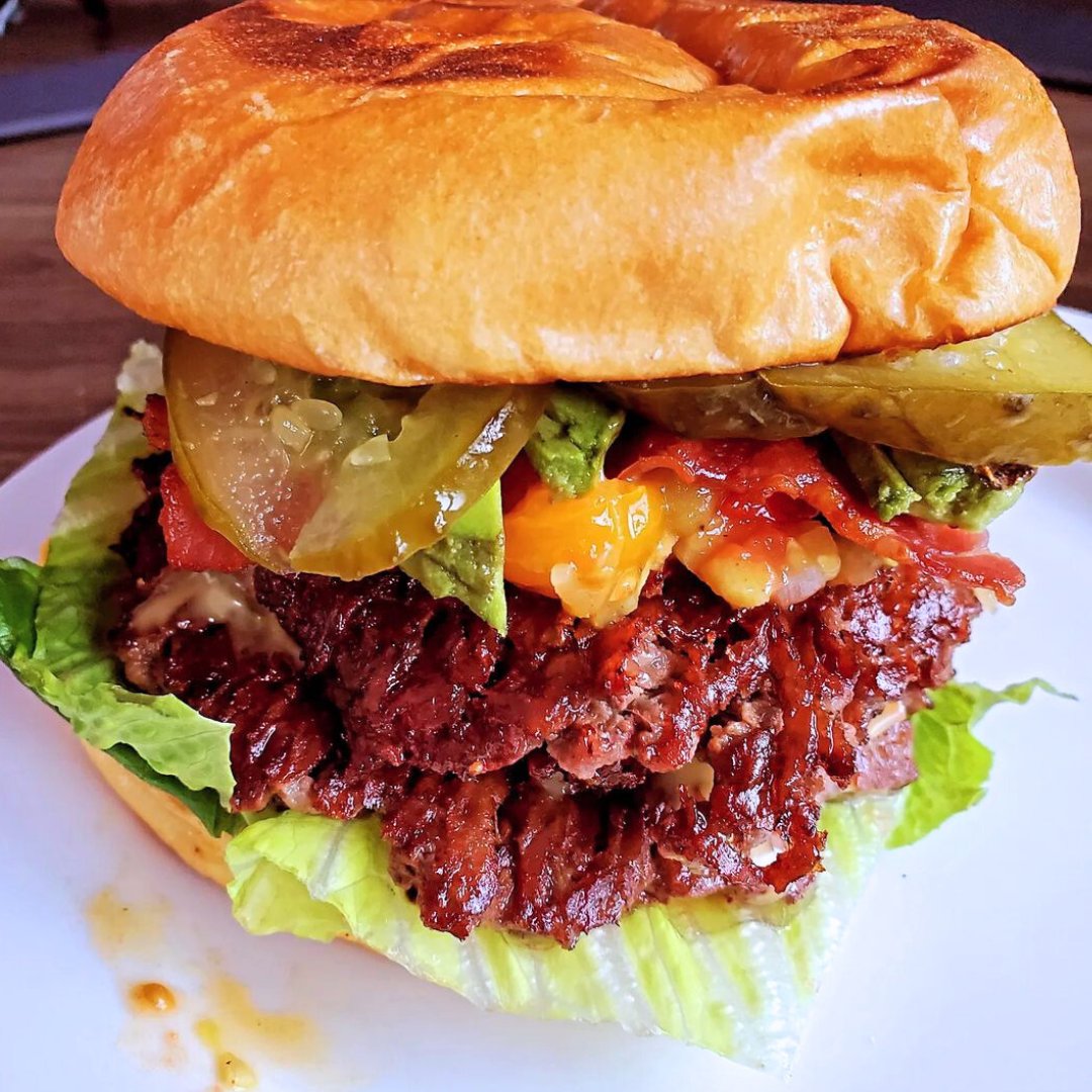 If you had to choose one word to describe this smashed burger, what would it be? 🤤🍔   #famousfoodfestival2024 #grilledpolishkielbasa #burgerlovers #burgerlovers101 #foodporn #foodie #burgerporn #cheeseburger #burgerlover #burgertime #eaterny #foodparadise #longislandfoodie