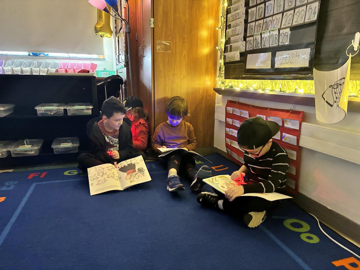 O’Block 1st graders celebrating #ReadAcrossAmerica week doing their reading in the dark!
