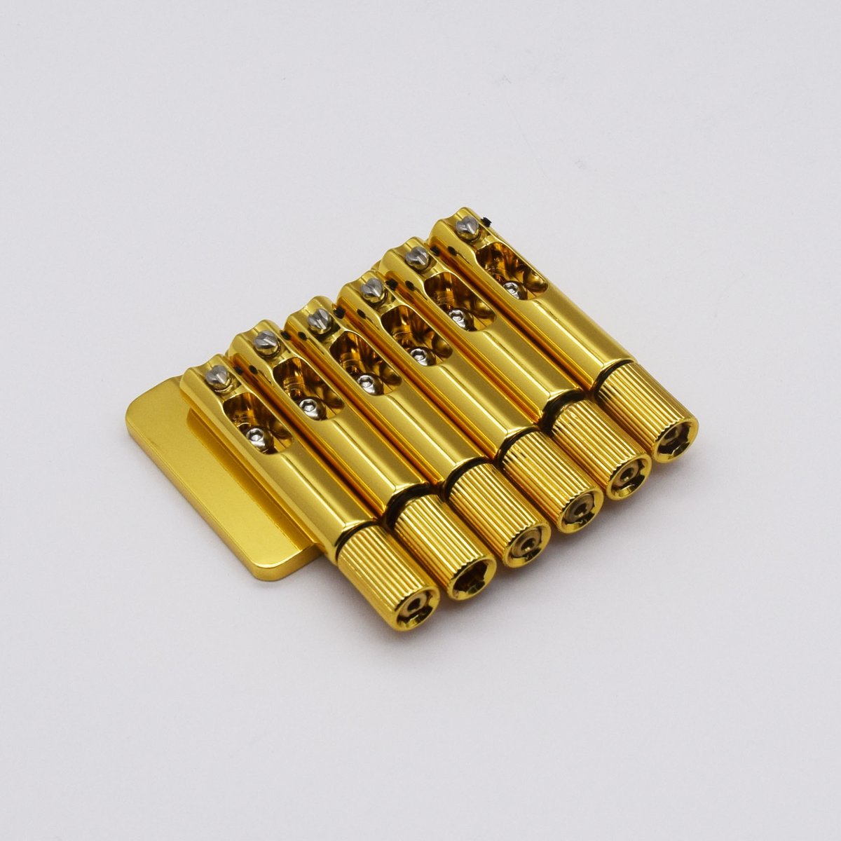 guykeroffi5384's tweet photo. 🌟Introducing our brand new headless guitar bridge in gold, designed to perfectly fit the Strandberg Boden Standard or any guitar with a string spacing of 10.5mm. We're also currently working on producing gold locking nuts to complement this stunning bridge. https://t.co/lxMlsfzgXx