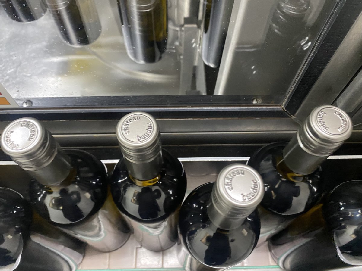 GavinQuinney's tweet photo. One large and sophisticated bottling machine is here for a couple of weeks. Plus a team of 10. All go for our @ChateauBauduc whites and rosés 2023. https://t.co/rC2tqWLWY1