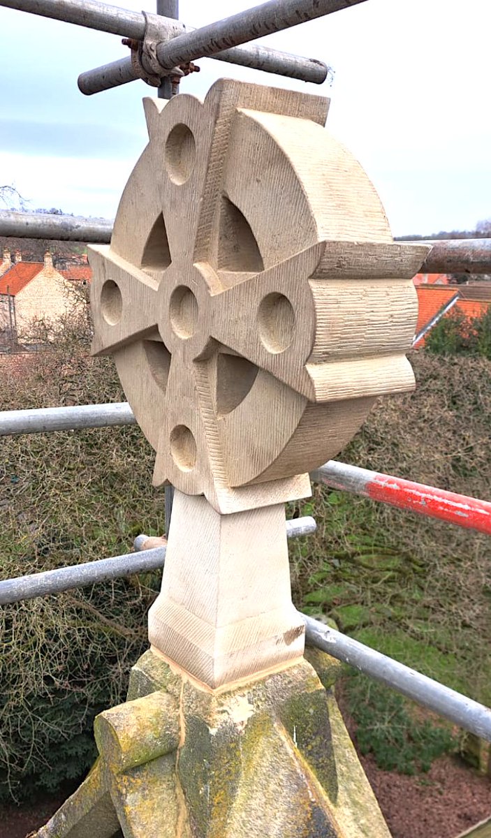 Replacement Cross masoned and fixed to the Nave, East gable at All Saints Church Helmsley, North Yorkshire