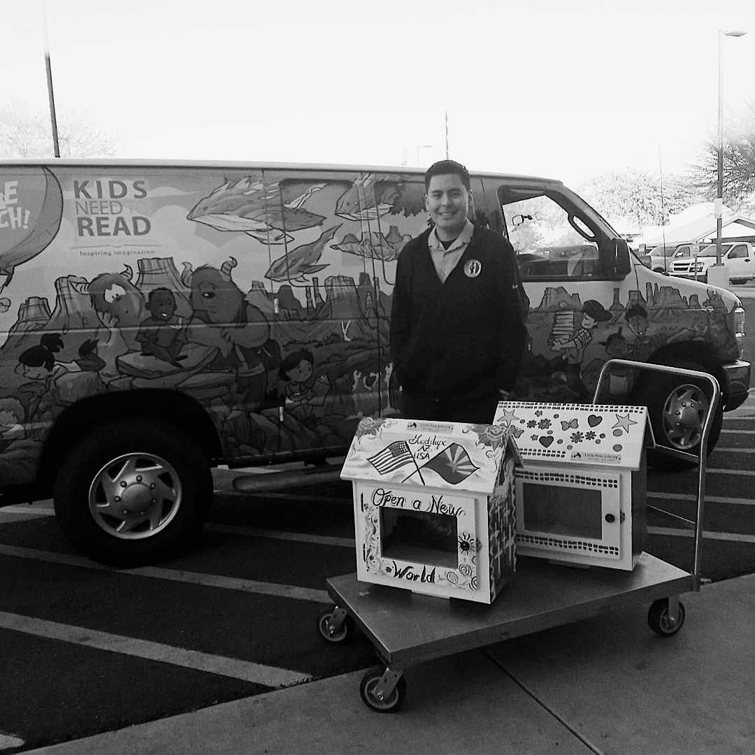 Celebrating reading with the Pascua Yaqui Tribe in Guadalupe, AZ. Kids Need to Read is honored to provide books for a community giveaway and to fill these beautiful community painted Little Free Libraries