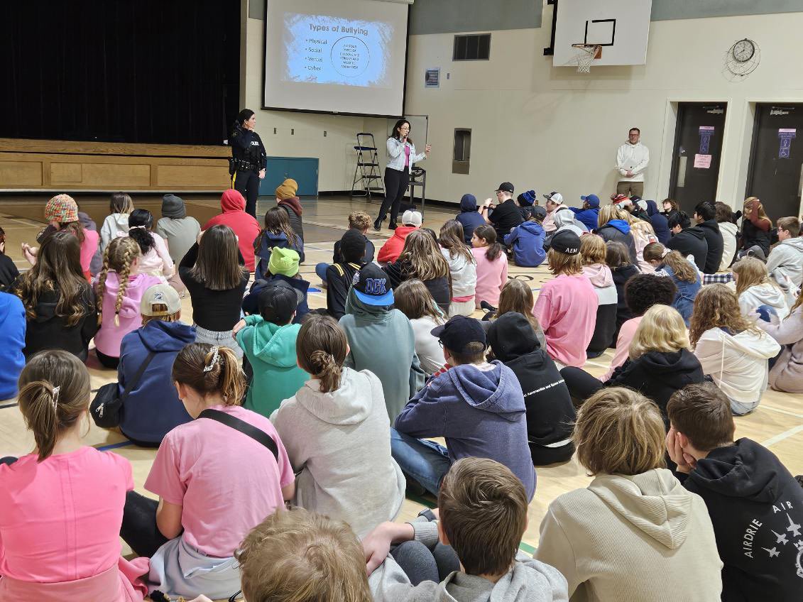 EAMS held multiple Antibullying assemblies today with the RCMP. Many students and staff wore pink shirts. #PinkShirtDay @rvsed