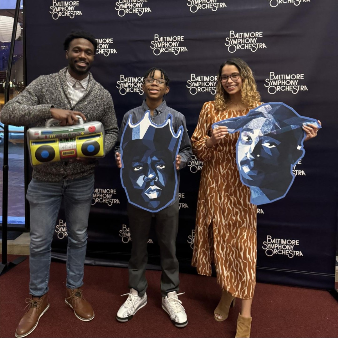 An eighth-grade student at Walter P. Carter did his National History Day project on Tupac and Notorious B.I.G. The Social Studies teacher, Ms. Chambres, secured tickets courtesy of the Baltimore Symphony Orchestra to take him to see 'Notorious B.I.G. x Tupac x Mahler.'