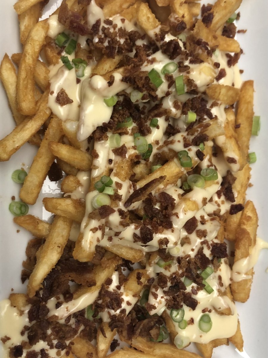 We took our cheese fries to the next level by adding crispy bacon, scallions, and the perfect queso. It's truly delicious! 😋 Come in and try it for yourself!⁣
⁣
#rooftop1091 #cheesefries #cookevilleeats #cookevillefoodie