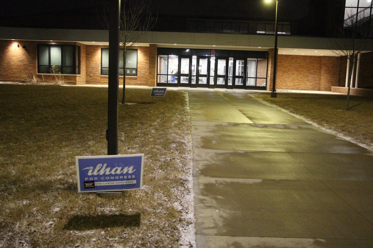 When you go to Richfield High School to visit the Republican Party's precinct caucuses, this isn't the campaign sign you expect to see outside the main entrance.
