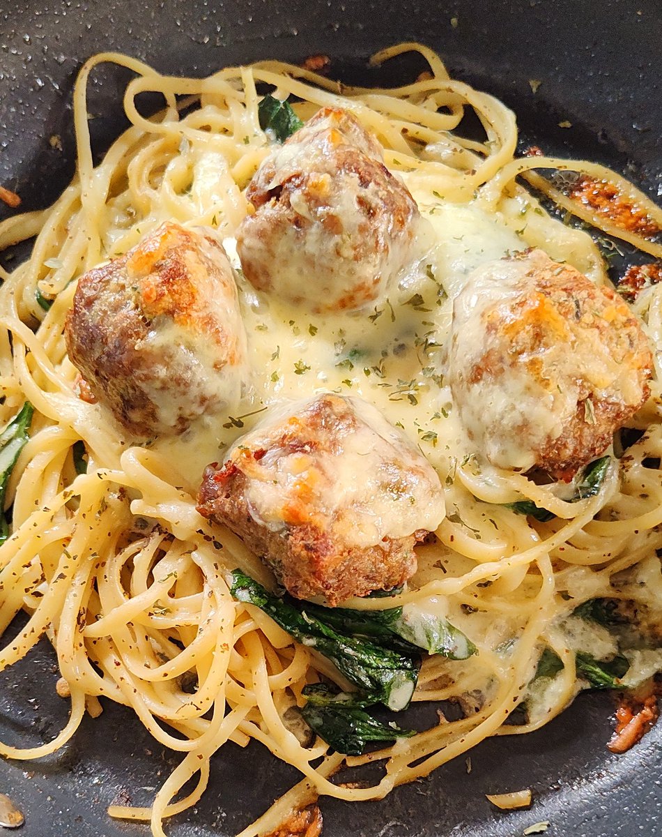 Homemade meatballs with spinach, kale, and chard over linguine. Topped with mozzarella. #CowboyTroyCooks #HickHopKitchen #CowboyTroy #HickHop #mozzarella