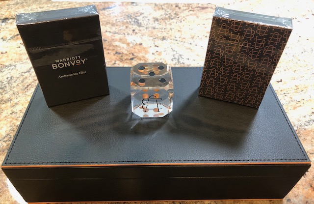 To all future Marriott Bonvoy Ambassadors - this will be your gift from Marriot: two decks of playing cards, an Ambassador's dice paperweight, and a pleather box in order to house all three of these items for safe keeping... Thanks <a href="/MarriottBonvoy/">Marriott Bonvoy</a> . We love you <a href="/MarriottBonvoy/">Marriott Bonvoy</a> .