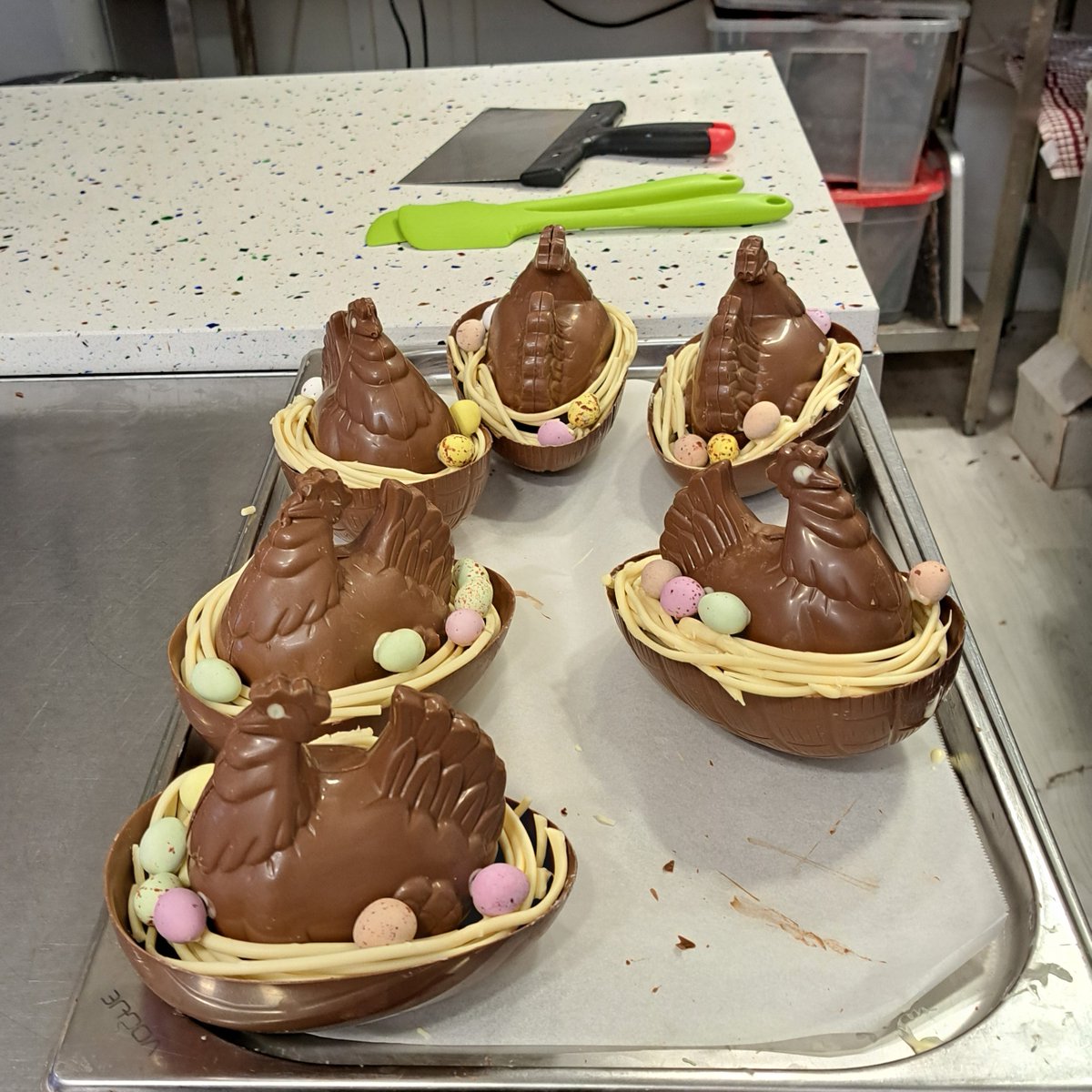 An unusual Easter gift - milk chocolate hens in a white chocolate nest. Made in-store this morning.