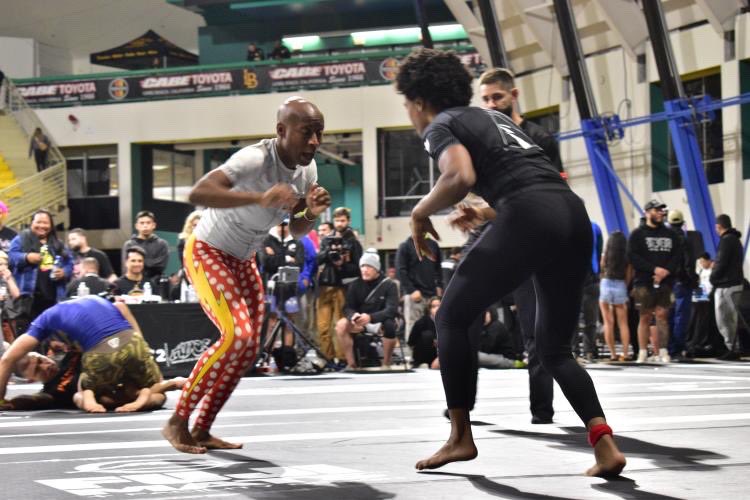 Littletoughguyy's tweet photo. Oh you know, just out here grappling with Angela Hill. 💜 https://t.co/Z9ZuddQqR1