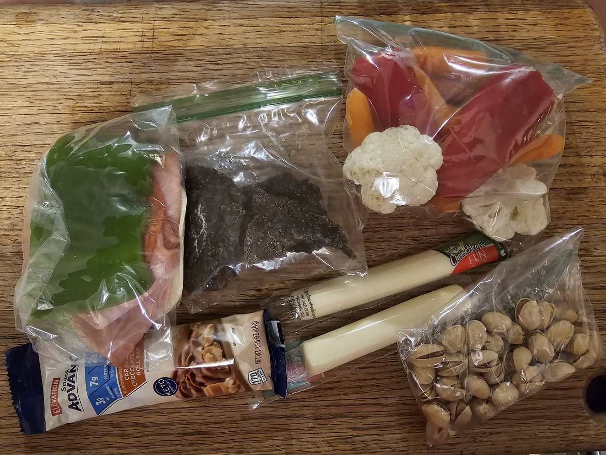 My husband's work keeps him very busy and make it hard for him to stop for lunch. I have to pack things that can be eaten on the go. He usually eats about half of this. Which half varies. 

What would you pack?

#Keto
#LowCarbLiving
#lchf