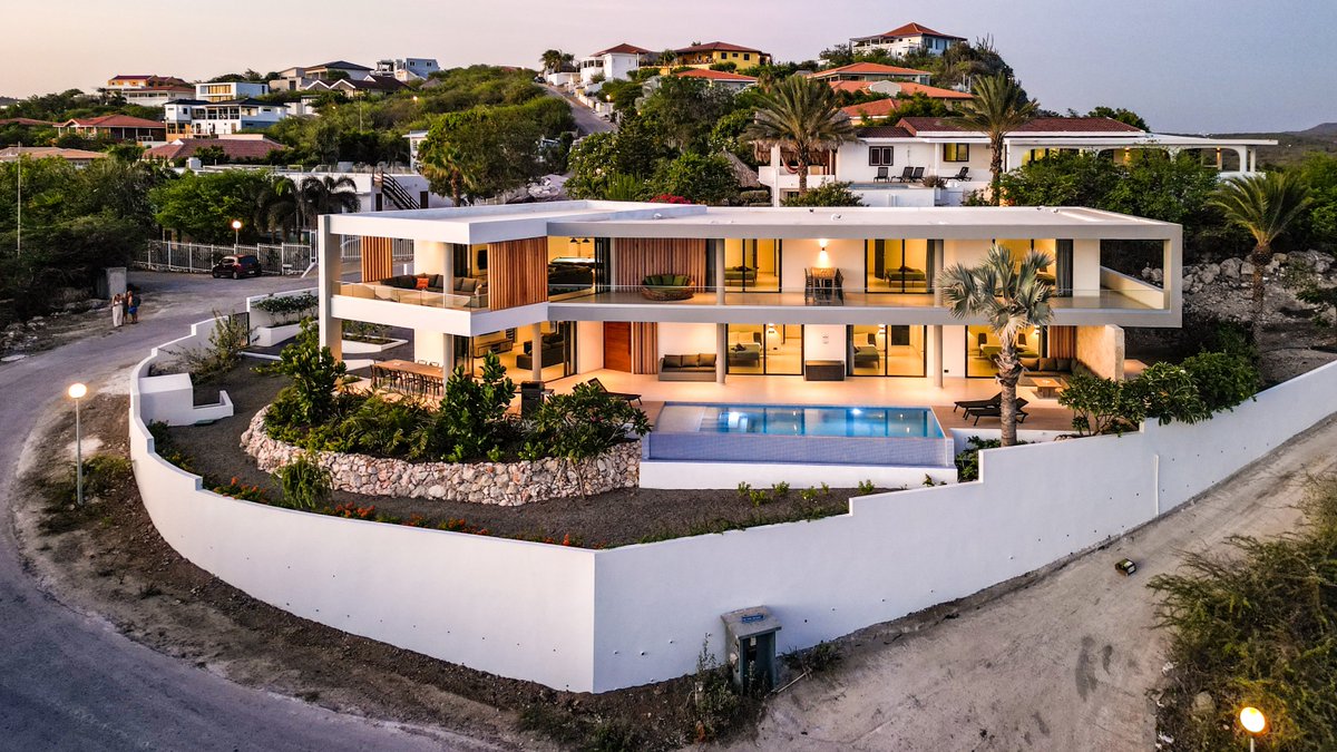 'Sunrise or sunset, our infinity pool offers breathtaking views any time of day. Dive into luxury at Cas Abou Seaview Mansion. 🌅 #InfinityPool #SeaviewMansion  #SeaviewSplendor #TropicalRetreat #BeachfrontBliss #SunriseSerenity #IslandGetaway'