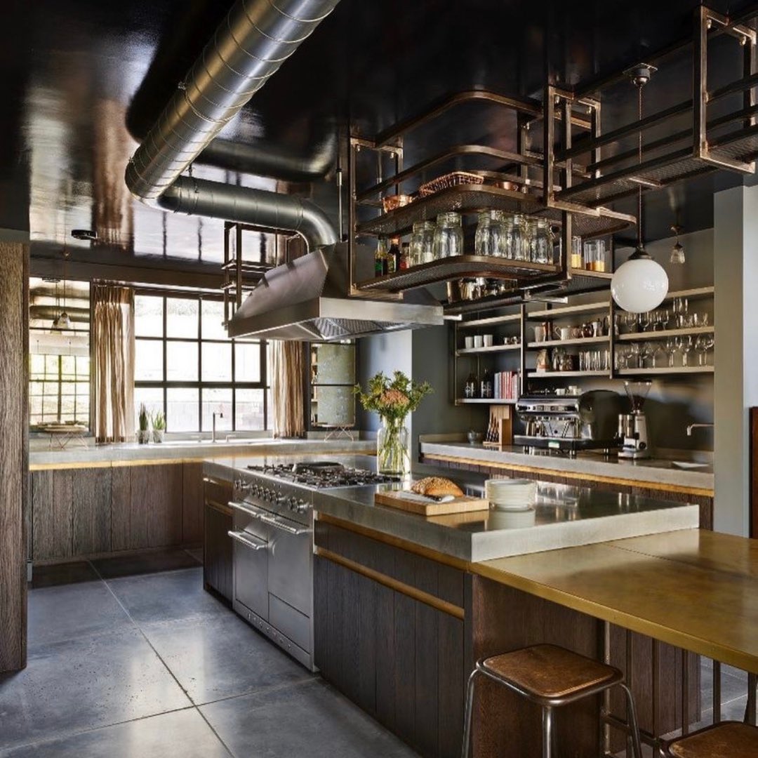 Westin island hood with suspension, and gorgeous exposed ducting in this incredible example of industrial chic from the talented team @InfoHandesign