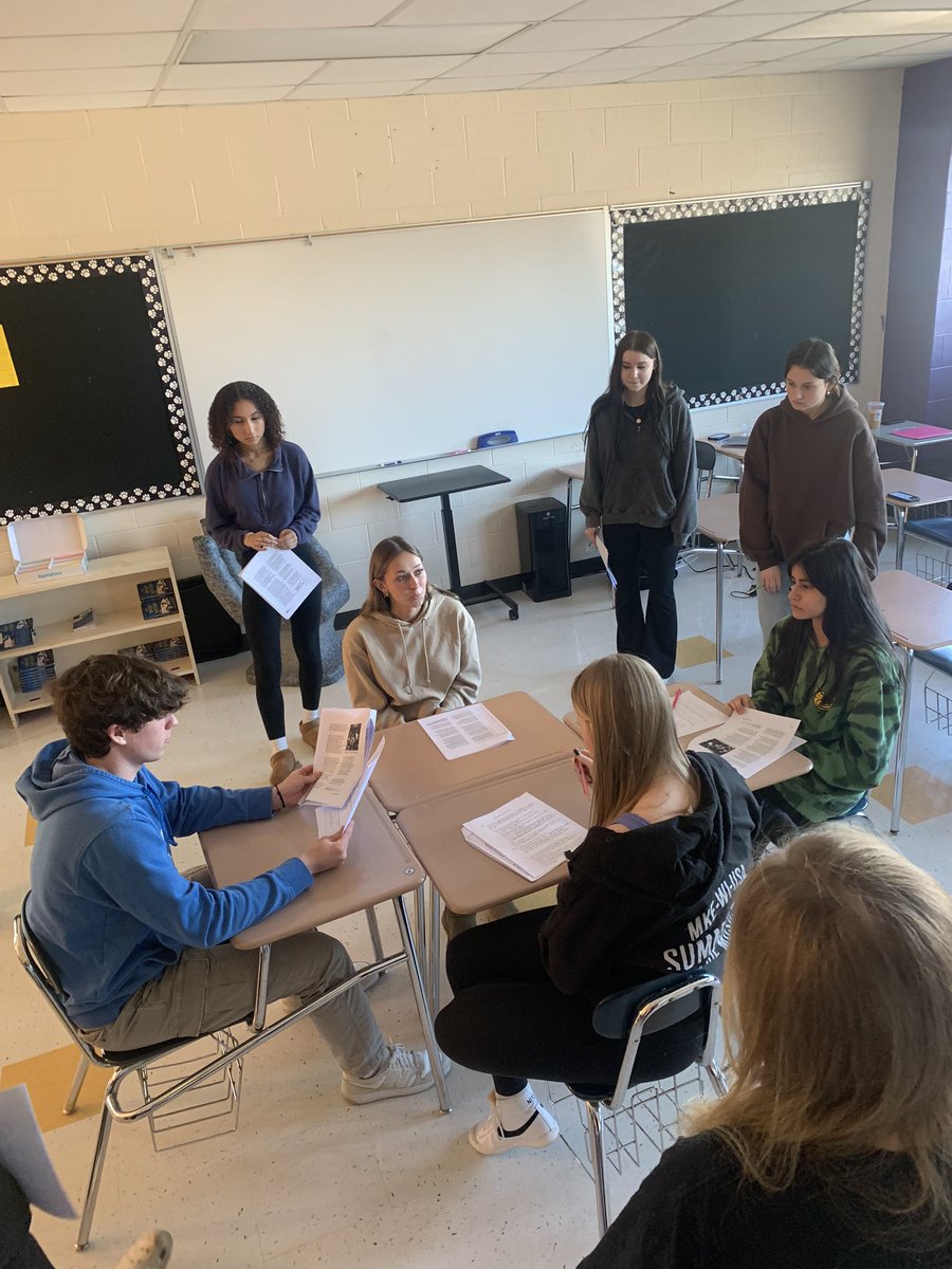 Using 4 chair to discuss Song of Roland and epic hero. They did a great job!