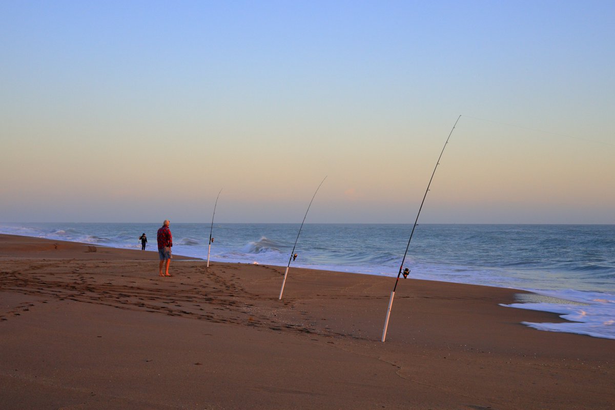 Good morning! Here is a picture of a couple doing some morning #surffishing in #Florida. Believe it or not,  #Beachcasters   do catch fish. They have even gotten high-tech. Recently, we saw a #Beachcaster using drones to carry their #bait into the ocean, far off the #beach.
