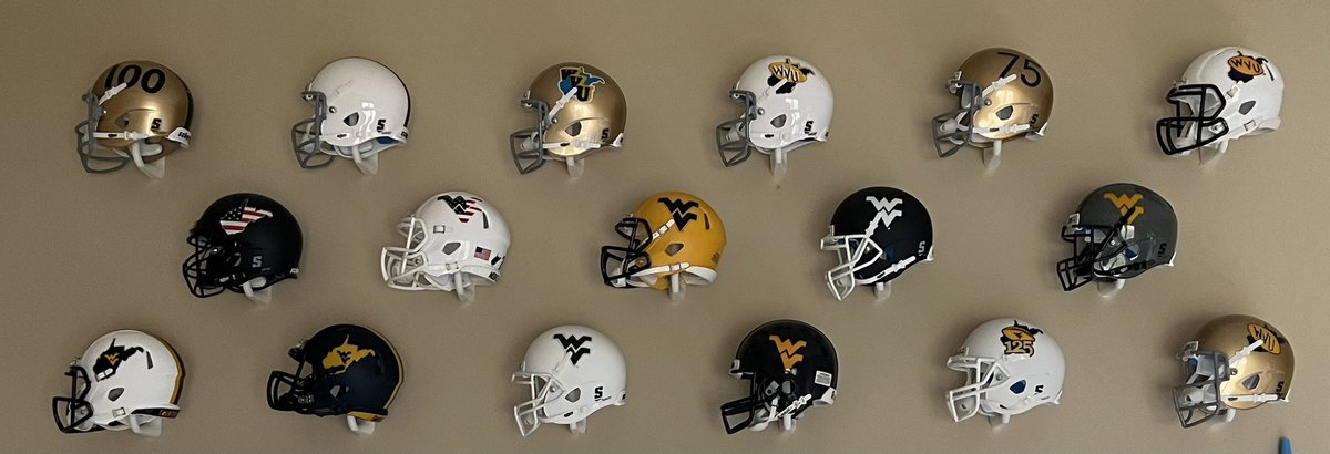 Michiganeer's tweet image. In the spirit of spring ball just around the corner, here is the latest addition to my @WVUfootball helmet wall.
#HailWV