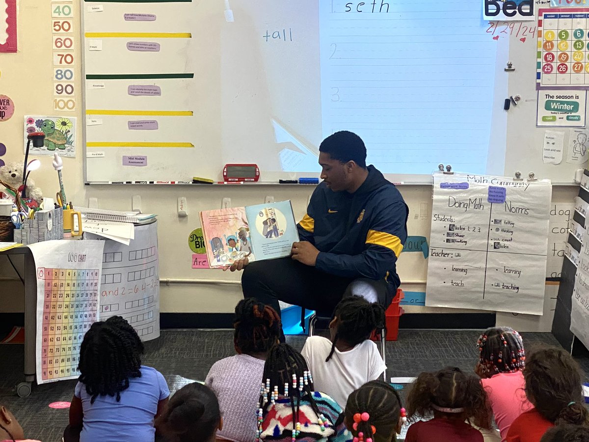 Some of our football players volunteering their time to read for the children at Washington Montessori School. Just doing what Aggies Do! #AggiePride | #AggiesDo | #Elite