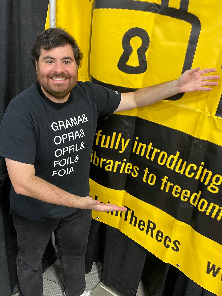 ReclaimTheRecs's tweet image. Hello, #RootsTech2024! Come visit our booth in the Expo Hall, so we can commiserate over tough records access issues, plan new lawsuits to get them, pick out an RTR t-shirt, and get free stickers and badge ribbons and candy!

(Here, board member Alec models a @Muckrock shirt.)