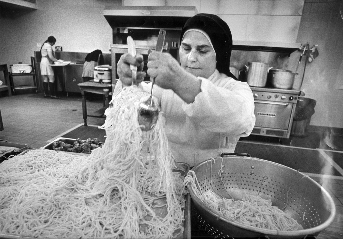 stjoanantida's tweet photo. Some things never change, like SJA's love for spaghetti. Here's Sister Lucy DeLuca serving up the good stuff back in the 1970s #ThrowbackThursday https://t.co/bpRqDMeRIM