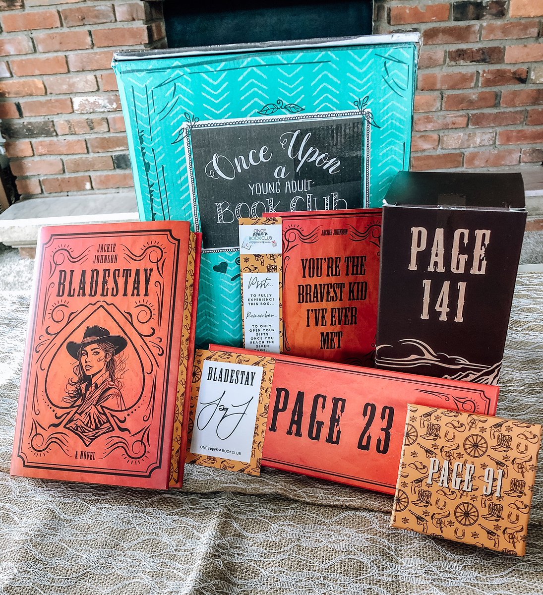 OUABookClub's tweet photo. Howdy partners! We are so excited to reveal our January "Bullets and Blades" Young Adult box book selection! This month's box featured a OUABC Experience Edition of "Bladestay" by Jackie Johnson! Miss out? Saddle up and shop now https://t.co/5DUxxdcNs4 #OUABC #bookboxsubscription https://t.co/pFX6u3DEKm