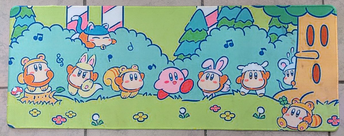 Currently I'm working at a toy store, when I noticed this Kirby Mousepad, it looks so cute!
 Because of where I live I know this isn't original, however I can't find the high res art or the fanartist who may have created this via Google search. So I'll post to share the cuteness!