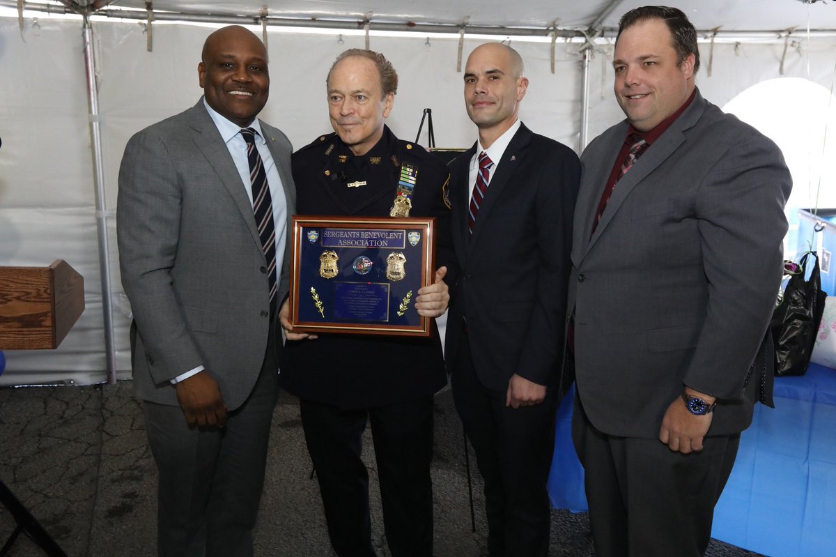 sbanypd's tweet photo. SBA VP Edmund Small, Marshal John Collins &amp; Director Brian Latva @NYPDQueensSouth wish SSA James A. Clark #PBQS @NYPDCommAffairs the best of luck today on his last day of work after 41 years of exemplary service. Thanks for doing such a great job, you leave quite a legacy. #nypd https://t.co/Ow2z2uYEGn