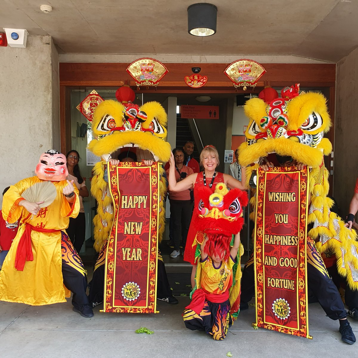 Throwback to our Lunar New Year celebrations at East Melbourne Library in February Wishing everyone a great start to The Year of the Dragon 🐉 (ID: A woman stands between 2 traditional Chinese lion dancers)