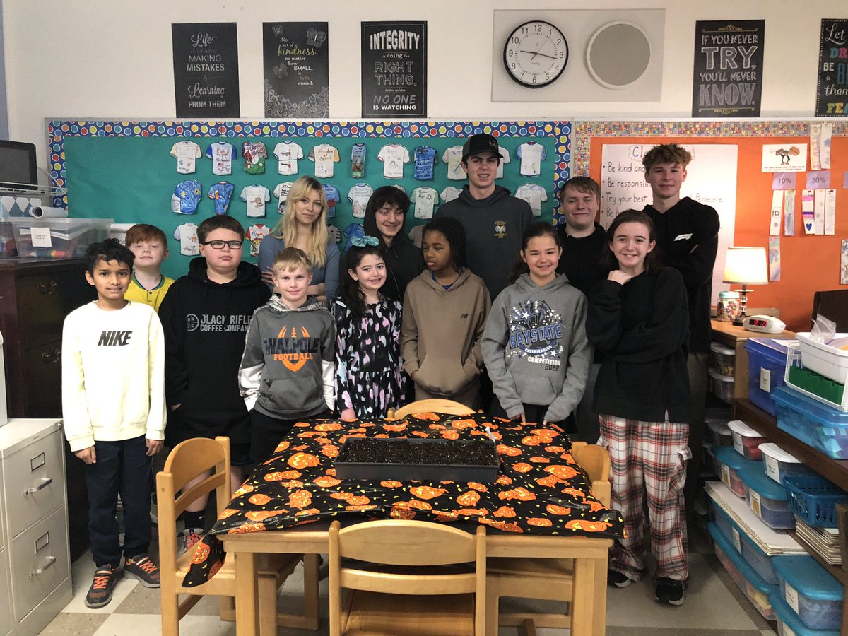 Students from the Norfolk Agricultural School helped us plant lettuce seeds for our school garden.