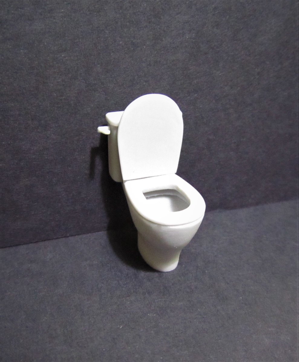 How do you make a 1/35th scale TOILET? Ask Paul Wade at Red Zebra Models...

"Make a Magic Sculp former for the inside. Once cured, cover in Vaseline as a release agent. Roll Magic Sculp into a thin sausage &amp; place around the former. Once cured, it pops off &amp; gives the shape"