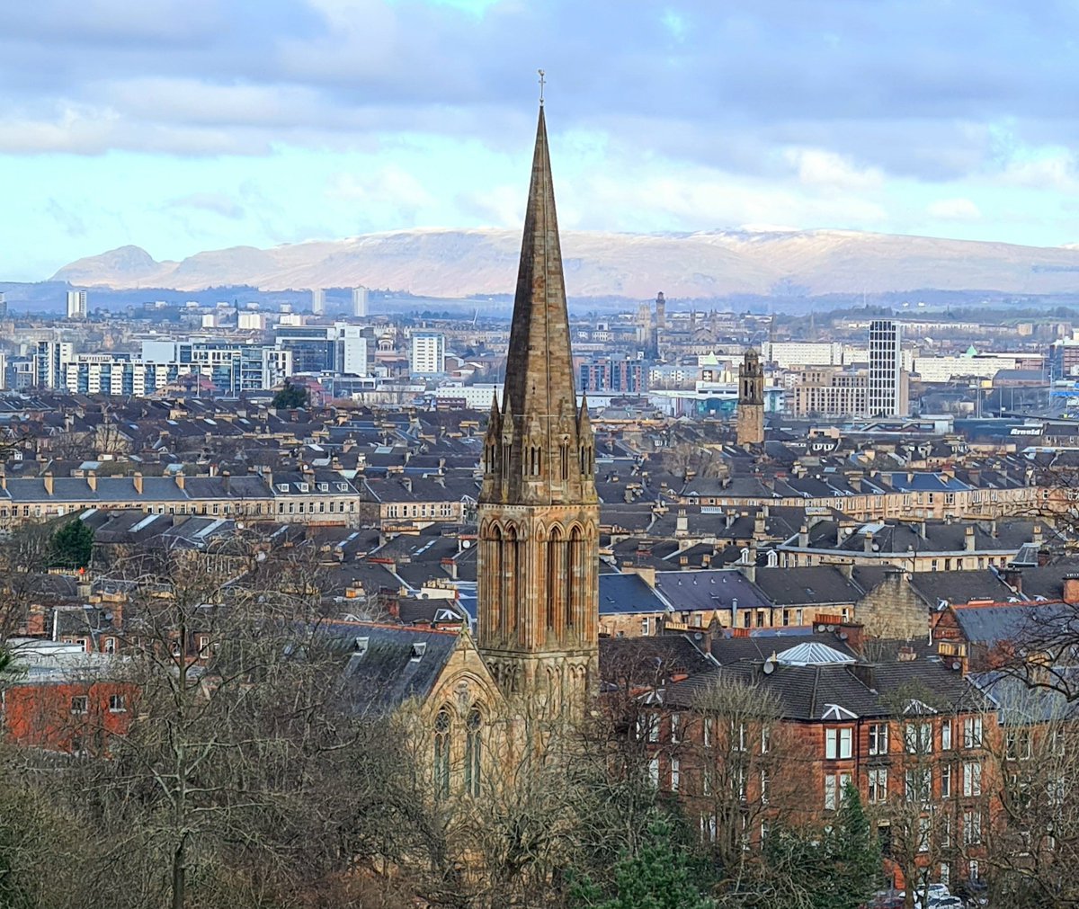 Today's view across Glasgow and beyond from the flagpole in Queen's Park on the Southside of the city, with the slightest dusting of snow just visible on the highest parts of the Campsies.

#glasgow #queenspark #cityscape #thecampsies #scotland #scottishlandscapes #glasgowtoday