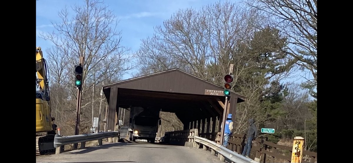 I guess this is a sign! This is the historic bridge in Strongsville. Monday the bridge will be demolished. I guess someone started early! #bridge #demolition #stuck #parks #FridayFeeling