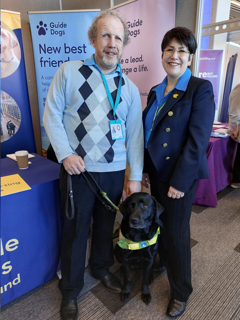 We're at @ScotTories conference today where it has been a brisk start for Neil and guide dog Poppy discussing pavement parking, access issues and inclusion with @Miles4Lothian and @TessWhite4NE #SCC24 @gdcampaigns